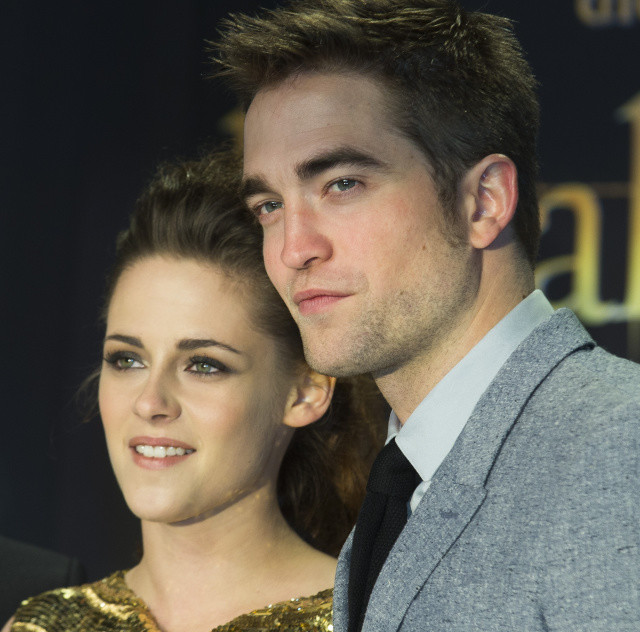 Kristen Stewart and Robert Pattinson attend the German premiere of "The Twilight Saga: Breaking Dawn Part II" in Berlin, Friday, Nov. 16, 2012. (AP Photo/Markus Schreiber)