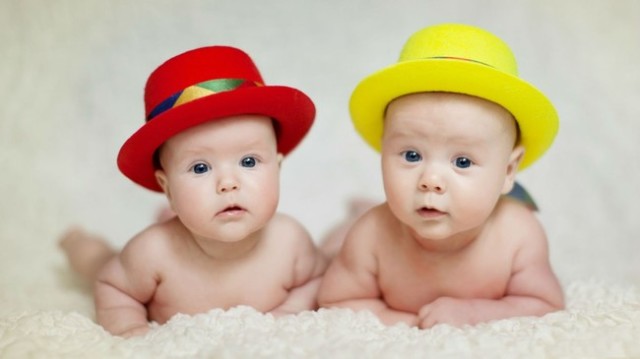 http://www.bhmpics.com/view-red_and_yellow_hat_in_two_babies-1366x768.html