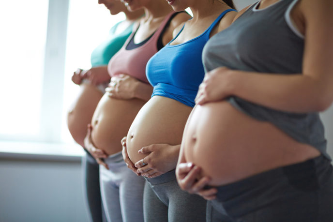 Row of pregnant women