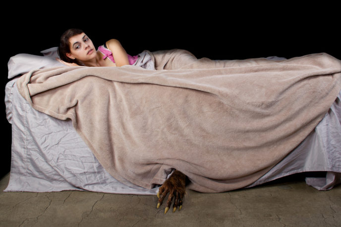 Young Woman Sleeping With a Monster Under The Bed