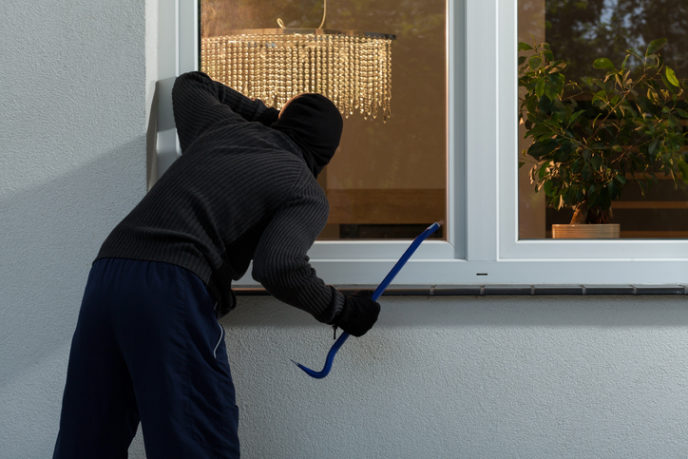 Burglar before burglary into the house