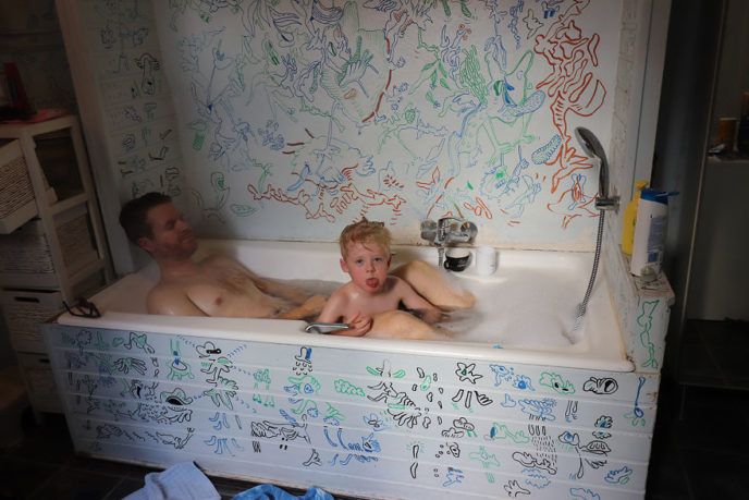 Husband and son in the doodle batbroom 2nd floor 5ab7e4d81458a__880.jpg