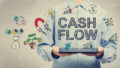 Cash Flow concept with young man holding a tablet