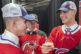 NHL Draft Hockey Juraj Slafkovský (vpravo) zo Slovenska pozdravuje krajana a kolegu draftu Montreal Canadiens Filipa Mesára, vľavo, ako sa na štvrtkové prvé kolo draftu hokejovej NHL v Montreale pozerá Šimon Nemec, tiež zo Slovenska a z New Jersey Devils