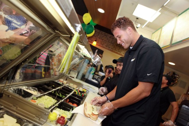 COMMERCIAL IMAGE - SUBWAYÆ Famous Fan and Los Angeles Basketball Star Blake Griffin co-hosts a SUBprize Party to celebrate SUBWAYÆ Restaurantís birthday, on Tuesday, Aug. 28, 2012 in Los Angeles. (Photo by Casey Rodgers/Invision for SUBWAYÆ/AP Images)