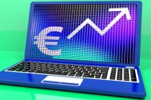 Laptop so znakom eura na monitore