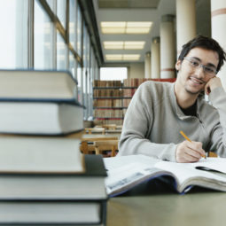 Portrait of a Student Studying in a Library