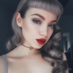 1 curly gray pin up hairstyle with bangs.jpg