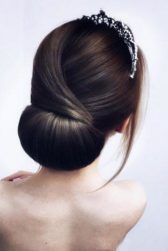 Wedding hairstyles 2019 sleek bridal chignon on dark medium hair hairstyle_by_elena_demchenko 334x500.jpg