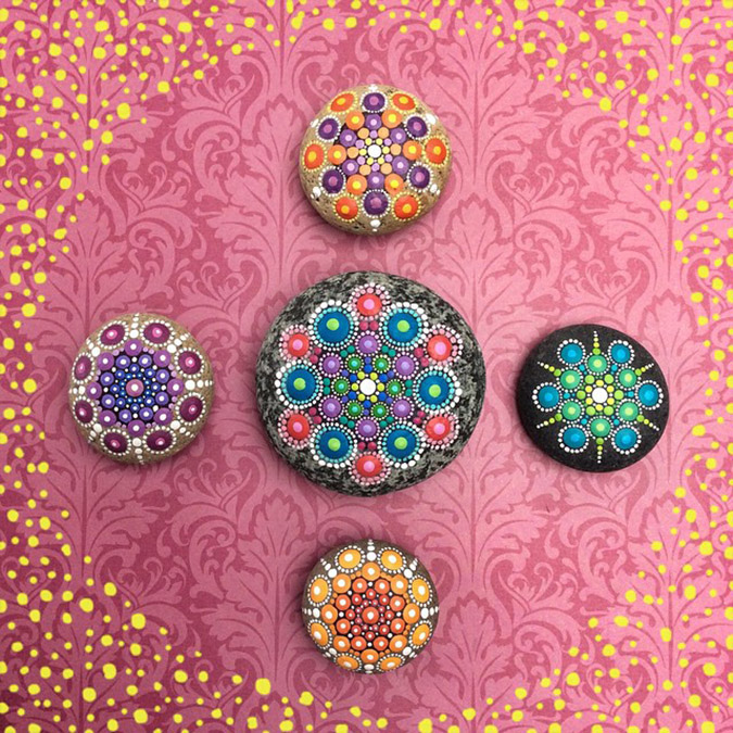 Vibrant colorful mandala stones.jpeg