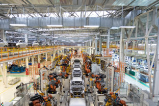 Body of car on conveyor Modern Assembly of cars at plant. automated build process of car body