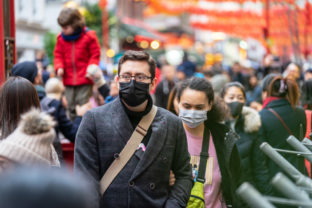 People wearing a face masks to protecting themself because of epidemic in China. Selective Focus. Concept of coronavirus quarantine.