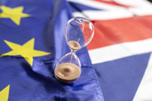 Out of time for brexit, hourglass over european and britain flag