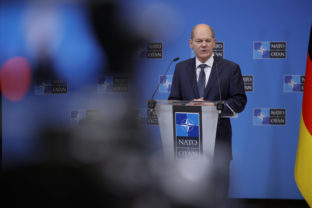 German Chancellor Olaf Scholz speaks during a press conference with NATO Secretary General Jens Stoltenberg in Brussels, Belgium,