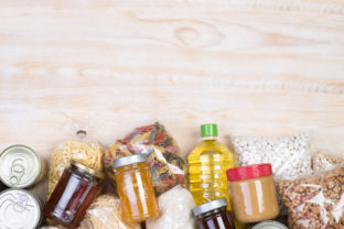 Food donations on wooden background