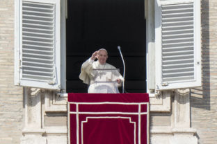 Vatican Pope Pope Francis greets the crowd as he recites the Angelus noon prayer from the window of his studio overlooking St.Peter's Square, at the Vatican,