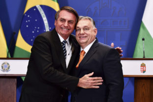 Hungary Brazil Hungarian Prime Minister Viktor Orban, right and Brazilian President Jair Bolsonaro hug each other at the end of a joint press statement at the Carmelite Monastery in Budapest, Hungary, Thursday, Feb 17, 2022. Bolsonaro is on a one day visit to Hungary after his meeting with Russian president Vladimir Putin. (