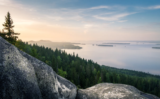 Scenic landscape with lake and sunset at evening in Koli, national park.