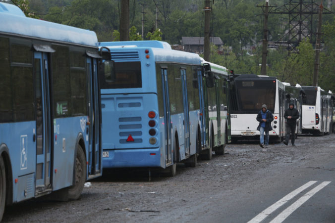 Buses wait for Ukrainian servicemen to transport them from Mariupol to a penal colony in Olyonivka after leaving Mariupol's besieged Azovstal steel plant, in Mariupol, in territory under the government of the Donetsk People's Republic, eastern Ukraine, Ukraine Russia Mariupol