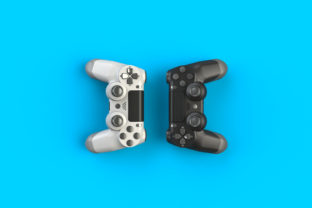 Computer game competition. Gaming concept. White and black joystick isolated on blue background, 3D rendering