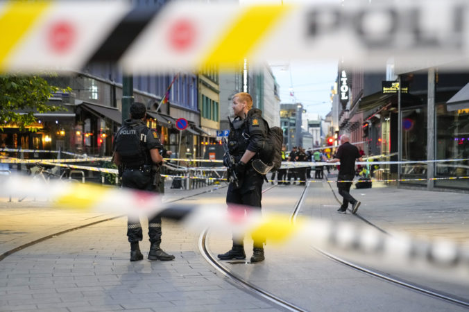 Police stand guard at the site of a mass shooting in Oslo, early Saturday, June 25, 2022. A few people were killed and more than a dozen injured early Saturday in a mass shooting in Oslo, Norwegian police said, as the city was gearing up for an annual Pride parade. (Javad M. Parsa/NTB via AP)