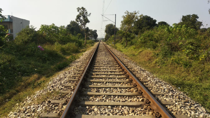 A railway Track passing from rural areas in India