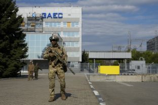 FILE - A Russian serviceman stands guard in an area of the Zaporizhzhia Nuclear Power Station in territory under Russian military control, southeastern Ukraine, on May 1, 2022. The Zaporizhzhia plant is in southern Ukraine, near the town of Enerhodar on the banks of the Dnieper River. It is one of the 10 biggest nuclear plants in the world. Russia and Ukraine have accused each other of shelling Europe's largest nuclear power plant, stoking international fears of a catastrophe on the continent. This photo was taken during a trip organized by the Russian Ministry of Defense
