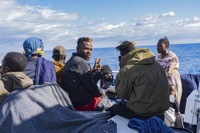 Migrants on the deck of the Rise Above rescue ship run by the German organization Mission Lifeline, in the Mediterranean Sea off the coasts of Sicily, southern Italy, Sunday, Nov. 6, 2022. Italy allowed one rescue ship, the German run Humanity 1, to enter the Sicilian port and begin disembarking minors, but refused to respond to requests for safe harbor from three other ships carrying 900 more people in nearby waters