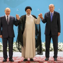 Russian President Vladimir Putin, left, Iranian President Ebrahim Raisi, center, and Turkish President Recep Tayyip Erdogan pose for a photo prior to their talks at the Saadabad palace, in Tehran, Iran, Iran, Tuesday