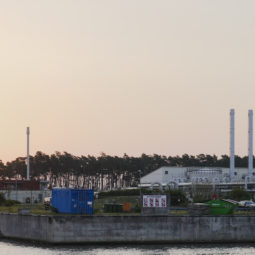 FILE - The sun rises behind the landfall facility of the Nord Stream 1 Baltic Sea pipeline and the transfer station of the OPAL gas pipeline, the Baltic Sea Pipeline Link, in Lubmin, Germany, Thursday, July 21, 2022. The suspected sabotage this week of two gas pipelines that tied Russia and Europe together is driving home how vital yet weakly protected undersea infrastructure is vulnerable to attack, with potentially catastrophic repercussions for the global economy