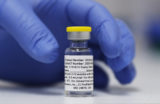 Virus FILE - A vial of the Phase 3 Novavax coronavirus vaccine prepared for use in a trial at St. George's University hospital in London on Wednesday, Oct. 7, 2020. On Thursday, Feb. 10, 2022, Novavax announced that its protein based COVID 19 vaccine proved safe and effective in a study of 12 to 17 year olds. Outbreak Novavax Teens